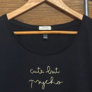 CUTE BUT PSYCHO  - L WOMAN BIO (Nera)